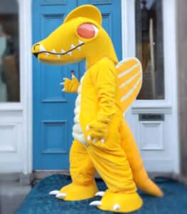A yellow dragon mascot costume