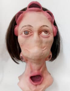 A custom sculpted latex head by our latex puppet sculptor