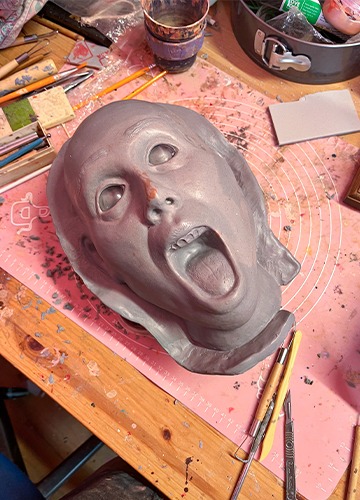 clay sculpture of head